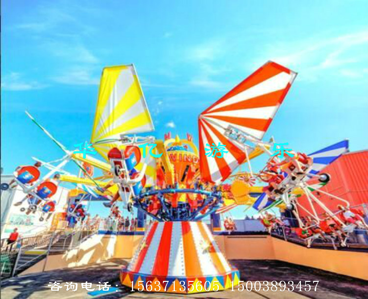 风筝滑翔具有高空驾驶之惊险,自由之悠闲,是一种游客可以自己控制升降的 现代游乐设施,带有滑翔伞的座舱围绕中心炫酷造型旋转,并逐渐上升,游客在飞行 中紧握操纵杆随意升降,互相追逐、竞走,搭配动感十足的炫酷音乐使游客能充分 体验到风筝在空中翱翔的穿越之感,而机臂的牵引和离心力的冲击,又使乘客在安 全的环境里尽情享受飞翔的快感和刺激,令人乐而忘返,该游乐设备不但性能优异, 操作简单,而且有着新颖的造型、华丽迷人的彩灯装饰,深受广大游客的喜爱。