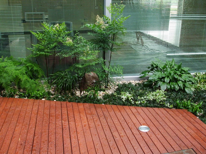 主要项目:水幕墙,鱼池,防腐木地面铺装,文化石造景,太湖石景观,休闲区